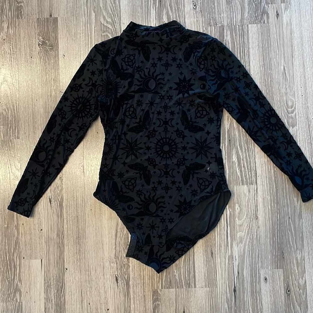 Blackmilk size L one piece